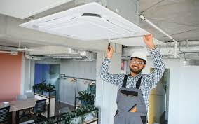 Certified Summit Air Conditioning technician repairing HVAC system in Orlando